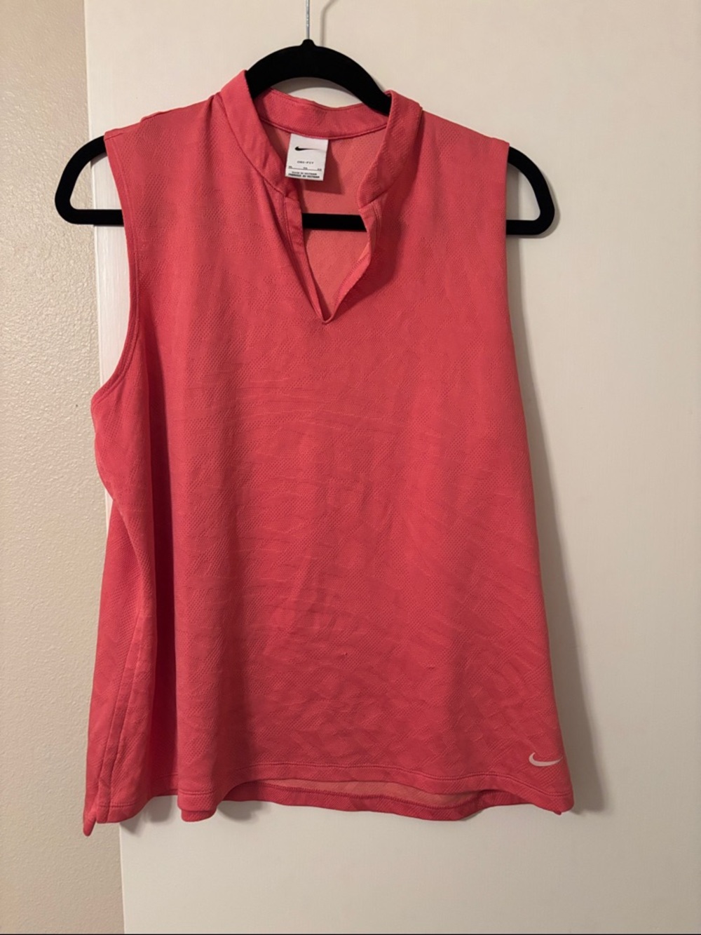 Nike Women’s Coral Pink Sleeveless Golf shirt